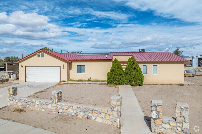 This ranch-style home in Vado has a metal roof for reliability.