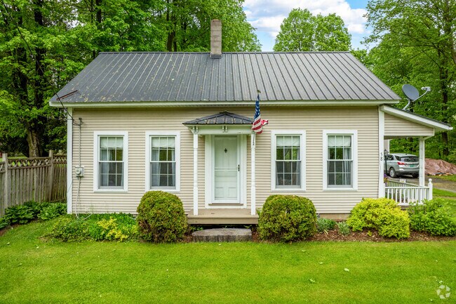 A ranch-style home in Derby Center has a durable galvanized steel roof to withstand the winter.