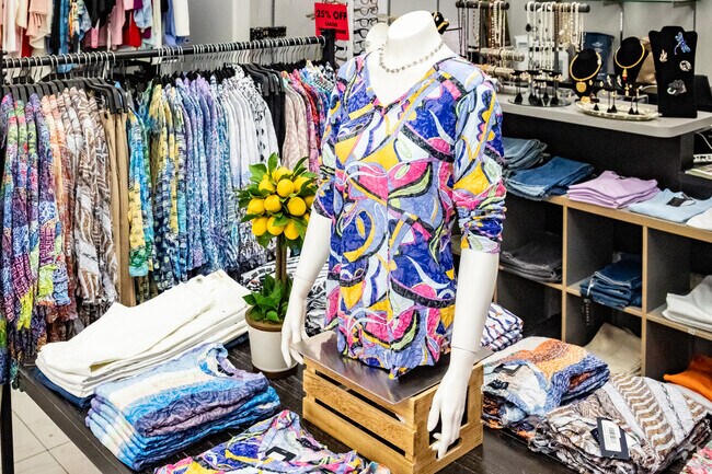 Carine Wang designs women's clothing with contemporary collections on display in Gainey Ranch.