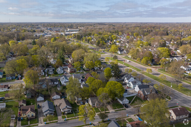 Aerial view of wooded residential streets in Greencroft Park.