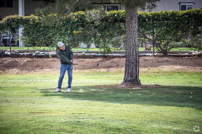 Work on your chip shot at Cottonwood Golf Center near Sunnymeadows.