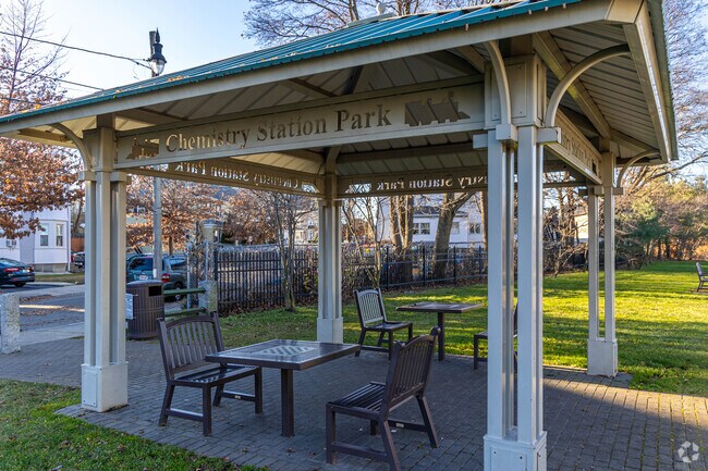 Chemistry Station Park has chairs and  tables where you can sit and enjoy.