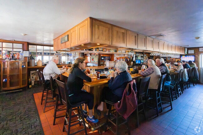 Briarwood locals dine and connect at The Gateway Tavern's friendly bar.
