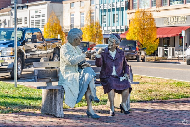 The sculpture of two women conversing  is located nest to the Court House in Newark, Ohio.
