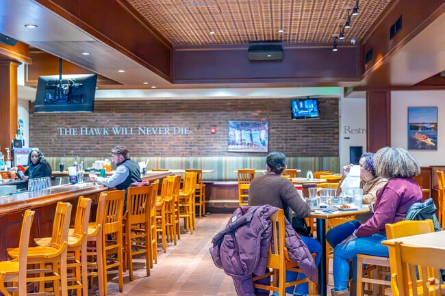 Sit at the bar with friends and family and share a drink in Overbrook at Landmark American.