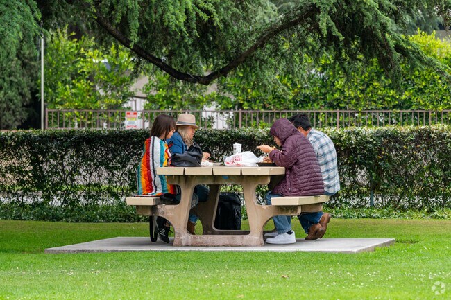 Surrounded by trees, park visitors can enjoy a nice shaded lunch at Michillinda Park's benches.