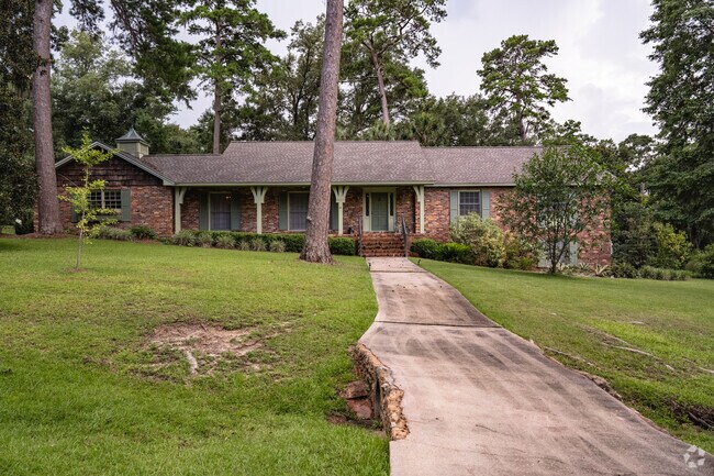 Brick ranch-style home reflects midcentury design in University.