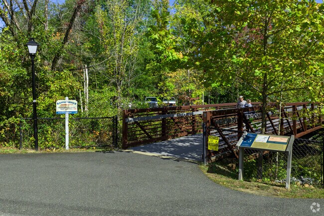 Locals embracing nature's beauty and exercise at Embery Dam Trail in Fall Hills.