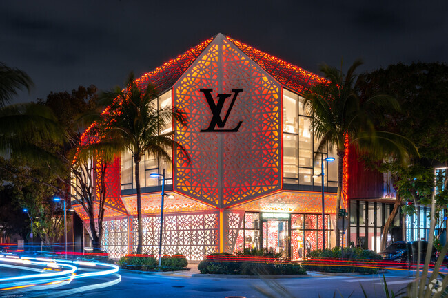 The Louis Vuitton store in the Miami Design District lights up at night.