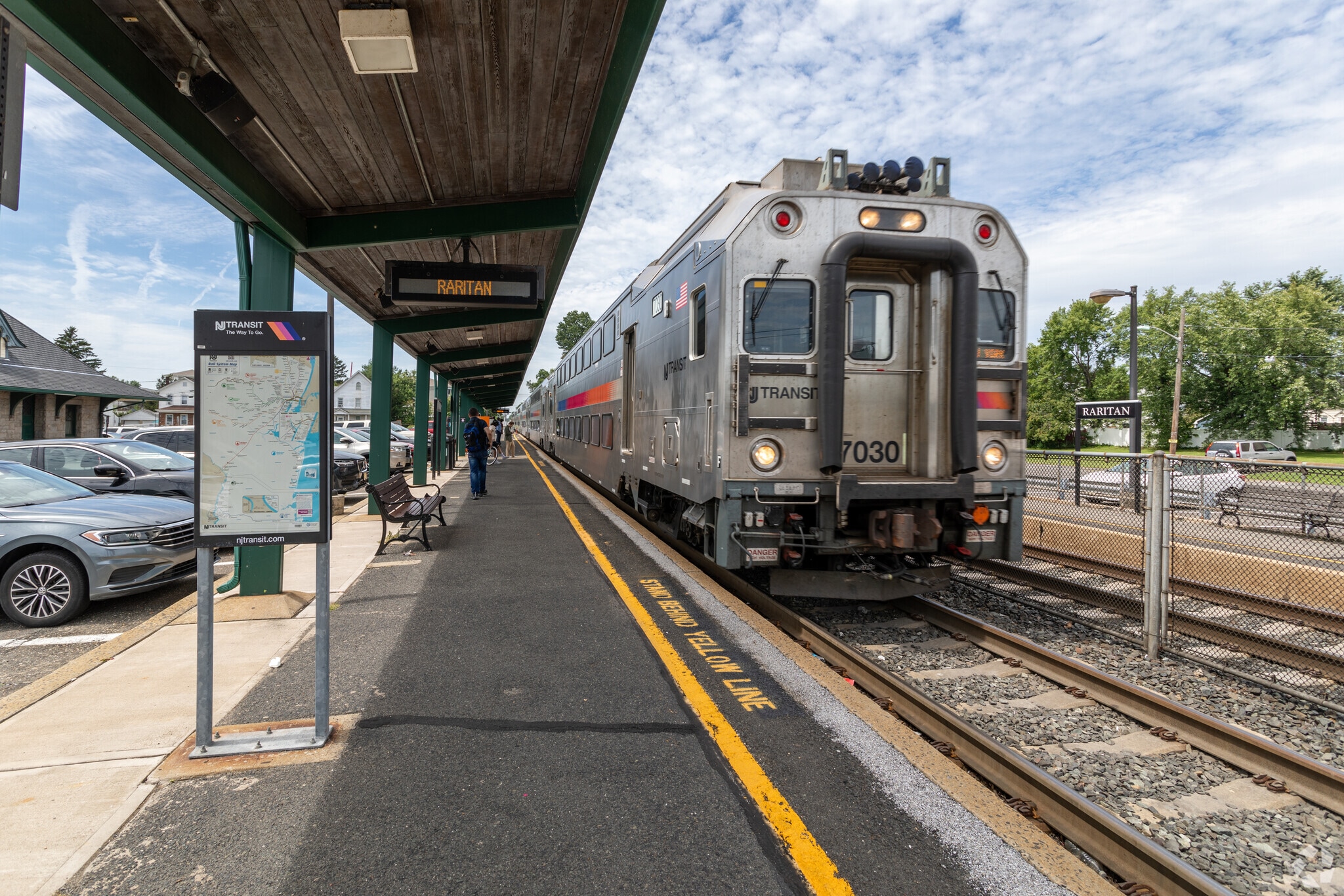 This train is heading to New York from the Raritan Train Station in Raritan.