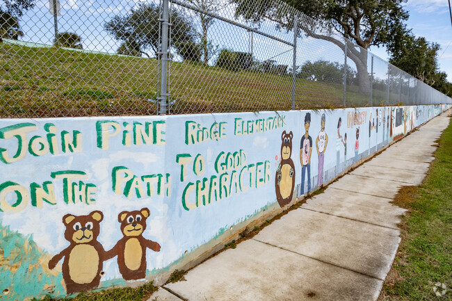 Residents enjoy the school spirt displayed on the walls at Pine Ridge Elementary School.