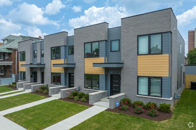 Pallister Gardens Townhomes have private fenced backyards and garages in Virginia Park Community