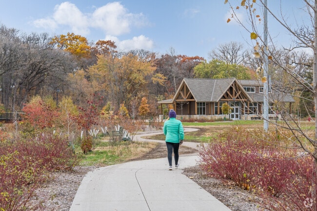 Someone walking along the path in Arden Park.