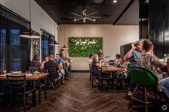 Curate in Koke Mill offers upscale small plates in a cozy interior.