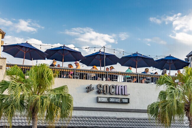 Open air roof top dining at The Social right next to New Port Richey East.