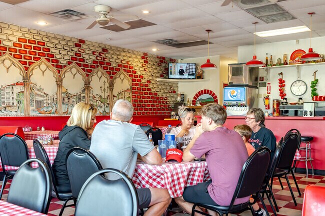 Minelli's Pizza, a neighborhood favorite  is located on Wilson  Road in Brookhollow.