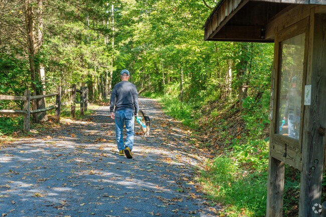 Residents walk through the Perkiomen Trail that stretches through Upper Salford Township.