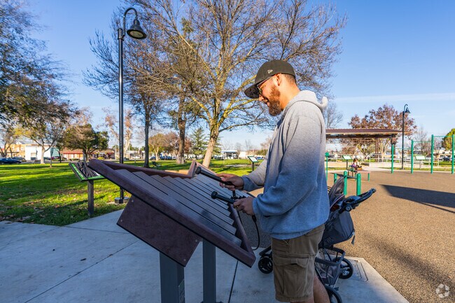 Play a melody on the xylophone at Madera County Courthouse Park in Madera, CA.