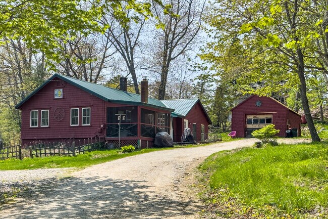 Photo of an old barn-style house from the 1960's in Woolwich, Maine.