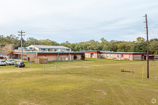 Sixth Ward Elementary School has large amounts of green space to play on.