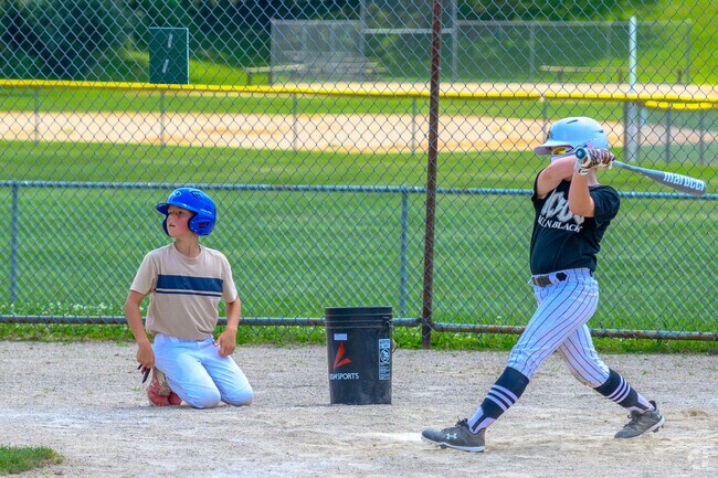 A couple of young superstars practice at Westwood Little League field.