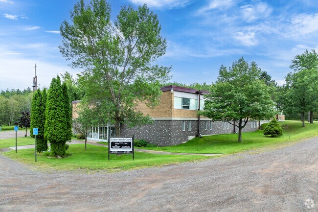St. Rose School is tucked away behind the trees.