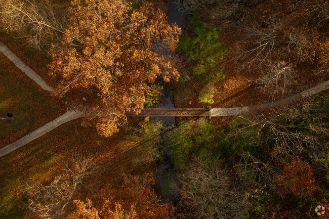 Enjoy a scenic walk across the bridge at Yeoman Park in Waukegan Gardens.