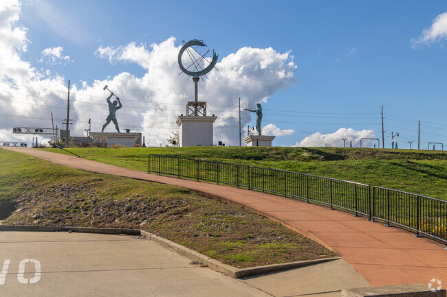 The Statues of Ashland look over the Ohio River at the Port of Ashland.
