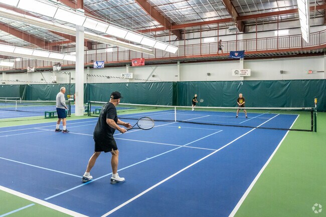 You can play tennis year-round at Capitol Racquet and Fitness Center near North Hills.