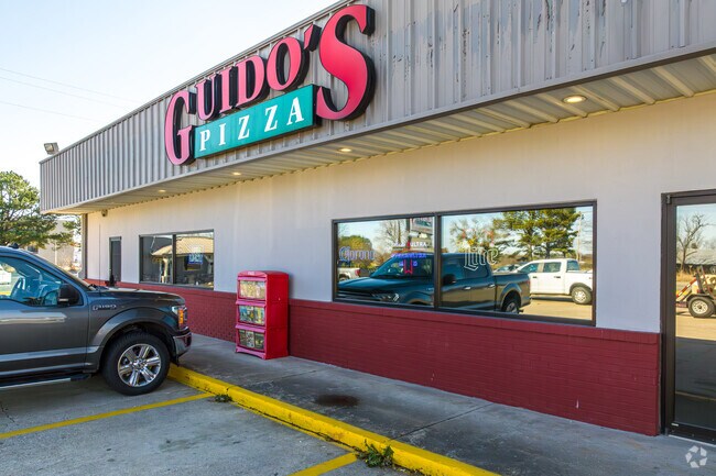 Stop in for pizza and a salad at Guido's in Tontitown.
