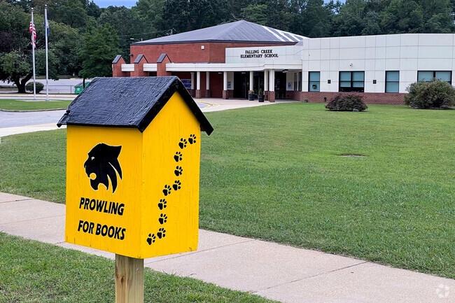 Logo of mascot on the little library outside of Falling Creek Elementary School.