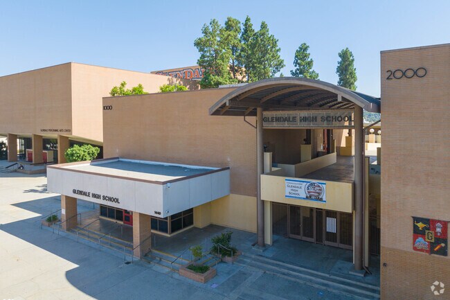 Glendale High School stands as a historic educational landmark, with its distinctive brick buildings and iconic clock tower visible from afar.