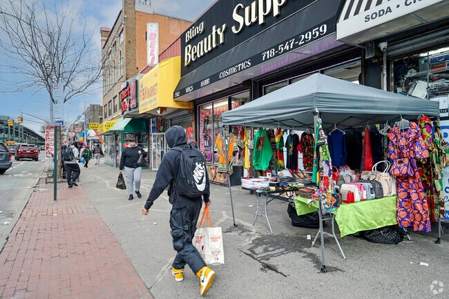 Residents of the Olinville community visiting the local shops and restaurants on a nice day.