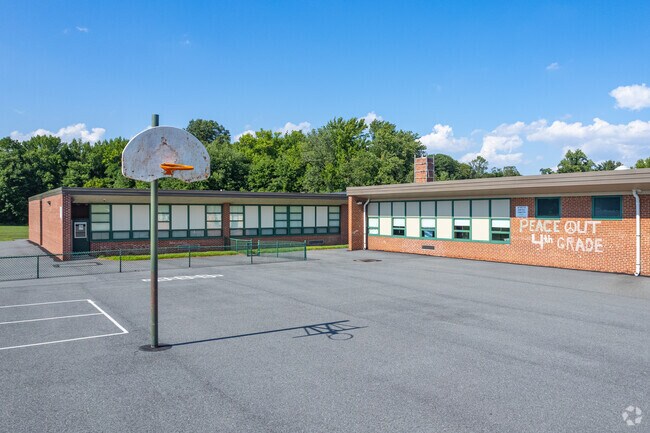 Grace Park Elementary School student's enjoy the basketball court.