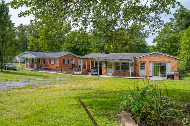 Brick ranches, one a fixer-upper, in Twin Lakes.