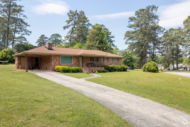 Open carports are typical for parking in many Greenview homes.