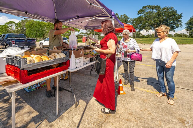 Buy local produce at the farmers market hosted by Lafreniere Park each Wednesday.
