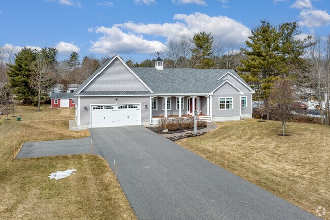 A lovely gray ranch-style home in East Saco, ME.