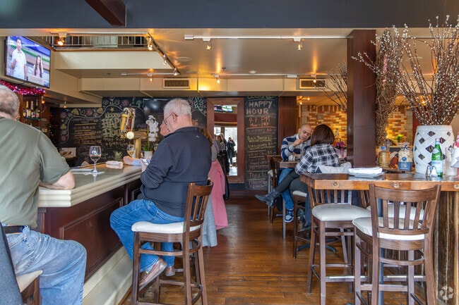 Warm ambiance, friendly faces, and neighborhood flavor at Woodstone Pizza & Grill make every night out in Rochelle Park feel like home.