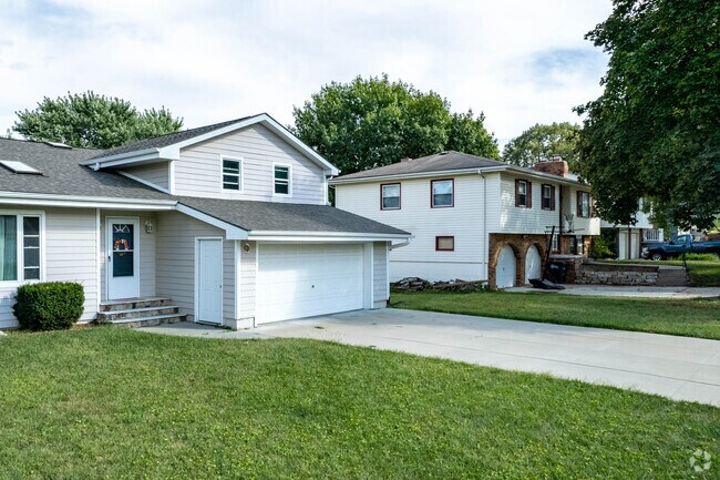 Most homes in the Wiesman/North Oaks neighborhood have wide driveways.