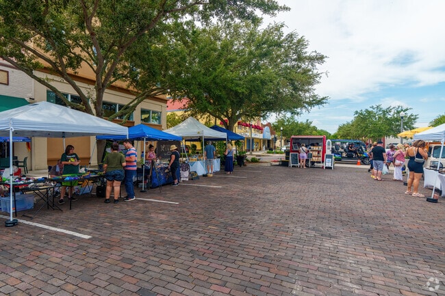 On Saturdays, Beck Hammock residents visit the local farmers market for produce and crafts.