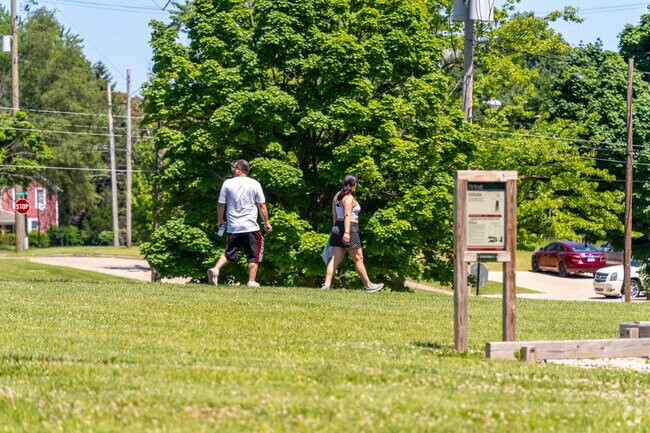 Wide sidewalks and paved pathways wind throughout Ballenger Park neighborhood.