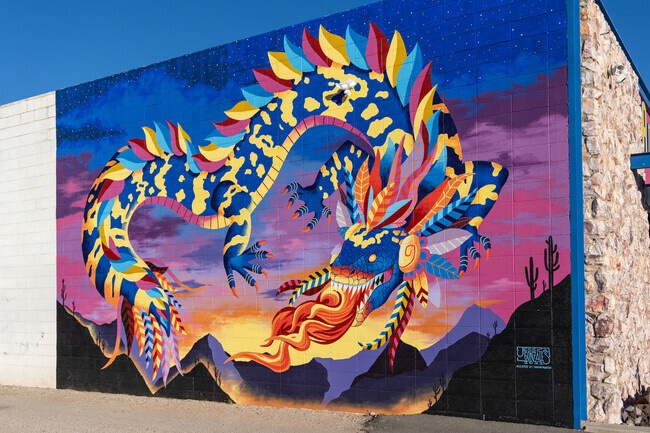 A vivid dragon mural stands out in Arroyo Chico by muralist Ignacio Garcia.