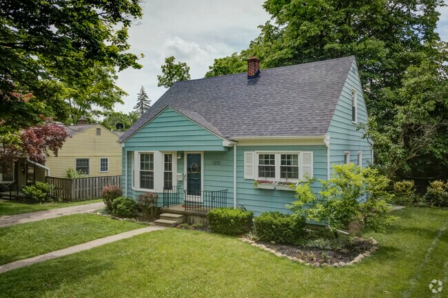 Locals have Cape Cod homes with tidy lawns in the Garden Homes neighborhood.