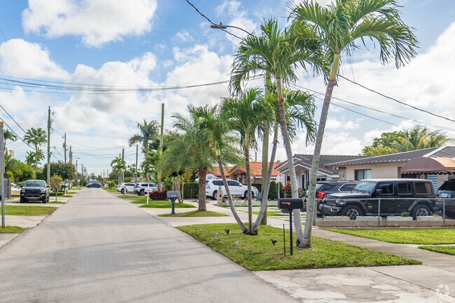 Live with palm trees and quiet streets in Westchester, FL.