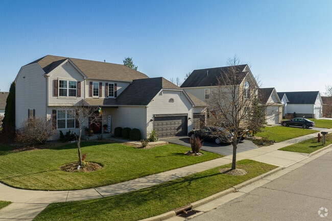 Prairie Lake neighborhood homes commonly have 2 car garages and two stories.