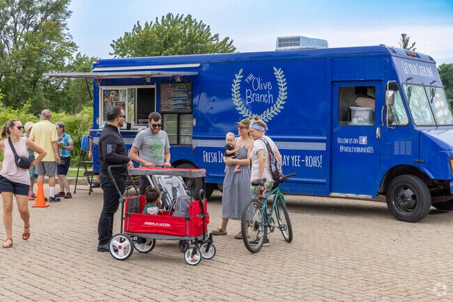 Rockford offers many public events including Food Truck Tuesdays near the Rock River.