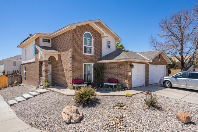 Find serenity in homes with beautifully landscaped desert yards in Near South Valley.