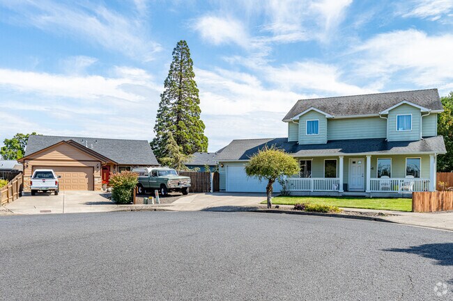 Homes in West Albany can be colorful with well maintained landscapes.