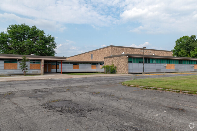 Closed since 2021, the George R. Staley Upper Elementary School has been securely boarded-up.